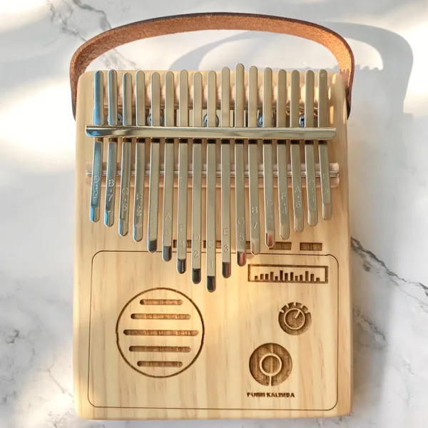 Đàn Kalimba 17 Phím Gỗ Vân Sam Nguyên Khối Radio Purm