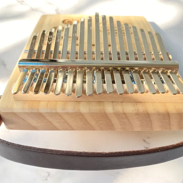 Đàn Kalimba 17 Phím Gỗ Vân Sam Nguyên Khối Radio Purm