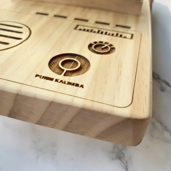 Đàn Kalimba 17 Phím Gỗ Vân Sam Nguyên Khối Radio Purm
