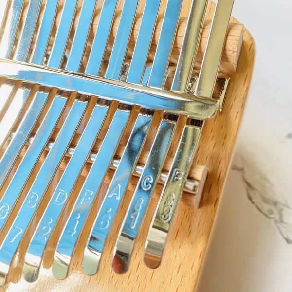 Đàn kalimba 21 phím Gỗ Nguyên Khối Cá Xanh Khảm Bo Góc