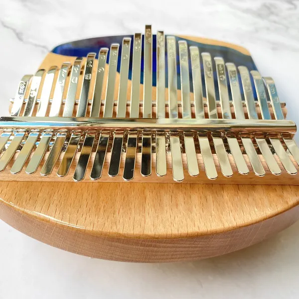 Đàn kalimba 21 phím Gỗ Nguyên Khối Cá Xanh Khảm Bo Góc