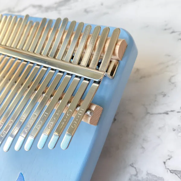 Đàn Kalimba 21 Phím Nguyên Khối Mahogany Cá Voi Xanh KaLinh