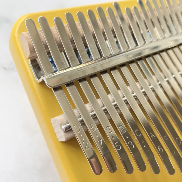 Đàn Kalimba 21 Phím Nguyên Khối Mahogany Cún Vàng KaLinh