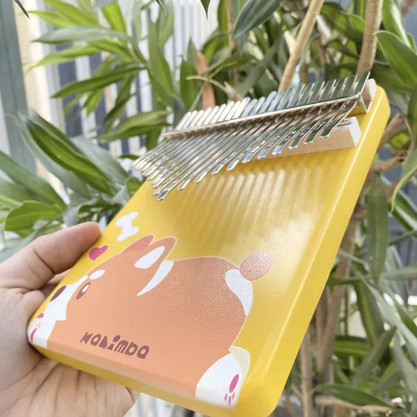 Đàn Kalimba 21 Phím Nguyên Khối Mahogany Cún Vàng KaLinh