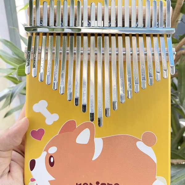 Đàn Kalimba 21 Phím Nguyên Khối Mahogany Cún Vàng KaLinh