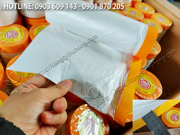 Bên trong cuộn băng dính che sơn nilon có phần băng keo giấy khổ 2f Bên trong cuộn băng dính che sơn nilon có phần băng keo giấy khổ 2f