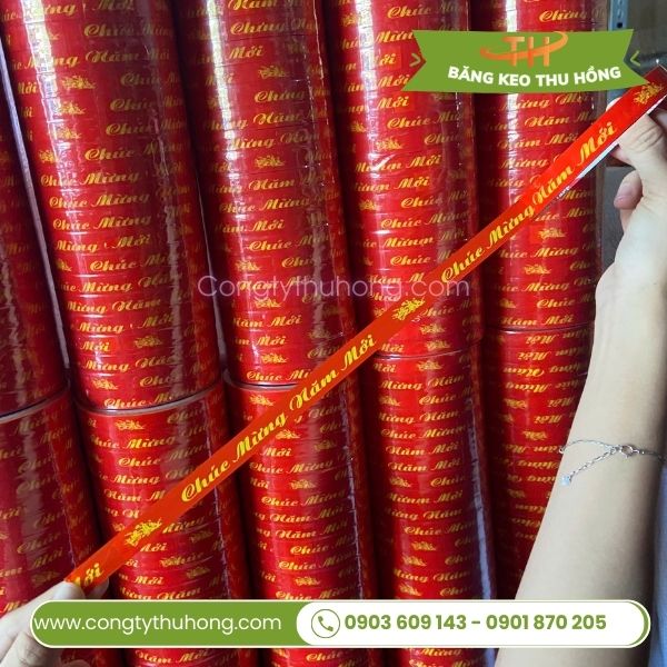 Băng keo chúc mừng năm mới khổ 1f2 - 12 cuộn/ cây Băng keo chúc mừng năm mới khổ 1f2 - 12 cuộn/ cây