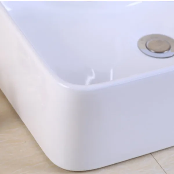 CHẬU LAVABO TRÒN ĐẶT BÀN SỨ TRẮNG
