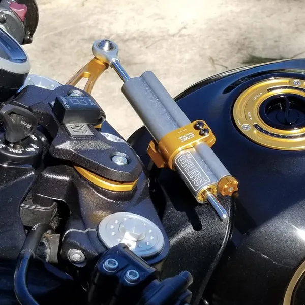 Pát trợ lực CNC Racing cho Ducati Scrambler