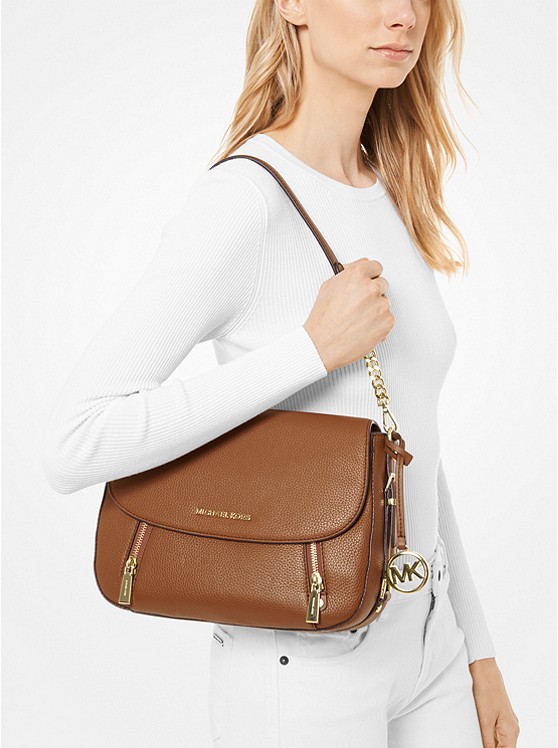 raven medium pebbled leather shoulder bag