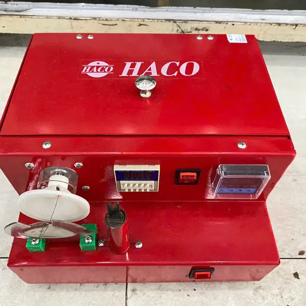 Máy quấn chân nút  hiệu HACO