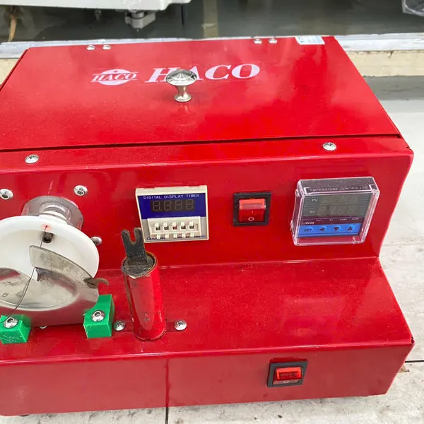 Máy quấn chân nút  hiệu HACO