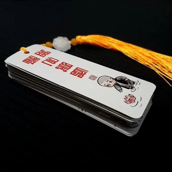 Thẻ bookmark Đánh Dấu Trang Hình Chú Tiểu Chibi Kèm Tua Rua Hoa Sen Chất Liệu Giấy Mỹ Thuật Cán Mờ 2 Mặt Kích Thước 4x12cm Phù Hợp Cho Học Tập Làm Việc Và Trang Trí Góc Làm Việc