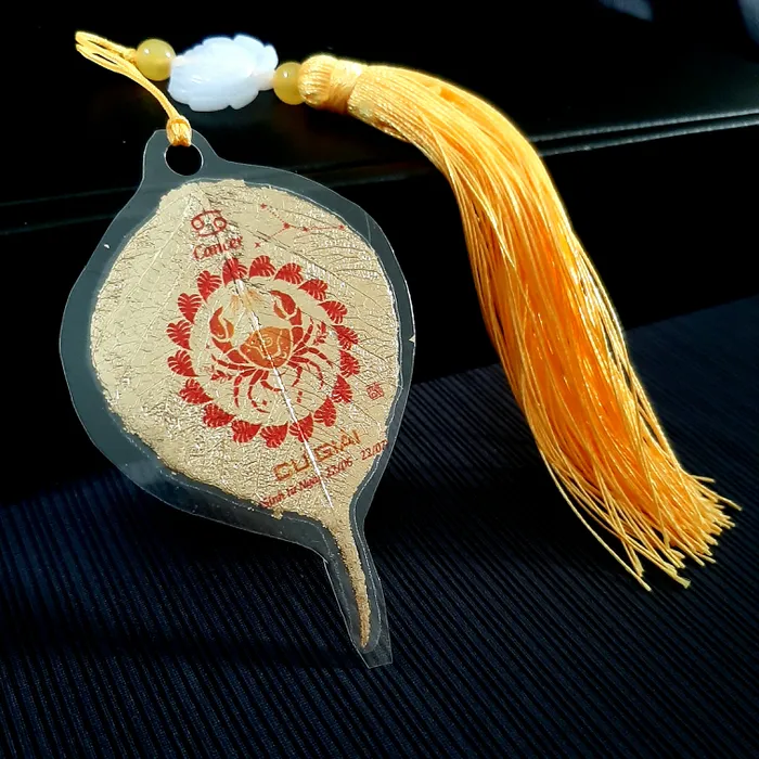 Lá bồ đề dát vàng cung CỰ GIẢI thuộc 12 cung hoàng đạo thể hiện tính cách qua ngày sinh kèm giải thích ốp lưng treo xe