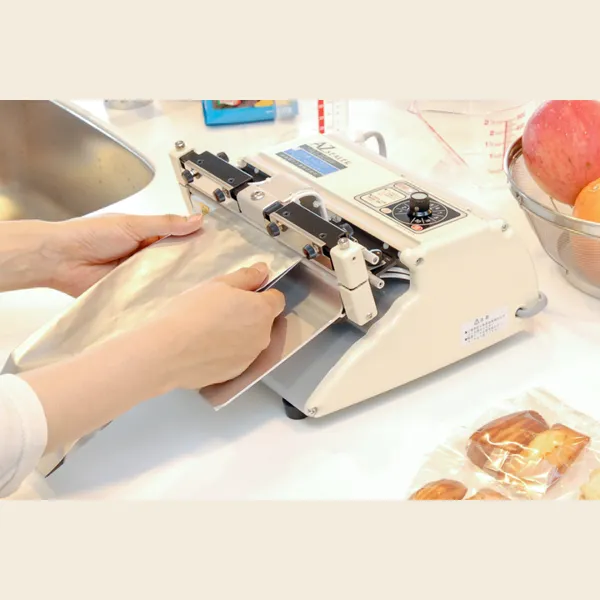 Máy hàn miệng túi dập tay AZ 200-300W