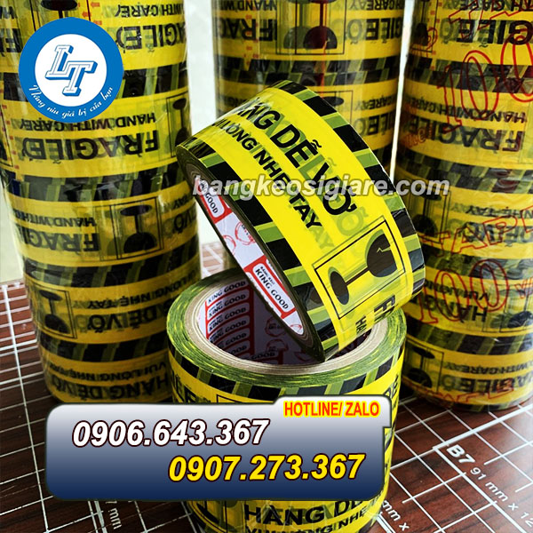XƯỞNG IN BĂNG KEO NIÊM PHONG CHỮ HÀNG DỄ VỠ băng keo hàng dễ vỡ nền vàng chữ đen