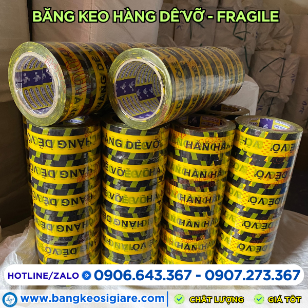 Băng keo hàng dễ nền vàng chữ đen sẵn kho Băng keo hàng dễ nền vàng chữ đen sẵn kho