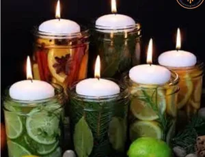 Trang trí bàn tiệc với những hũ mứt nến thả nước ikea