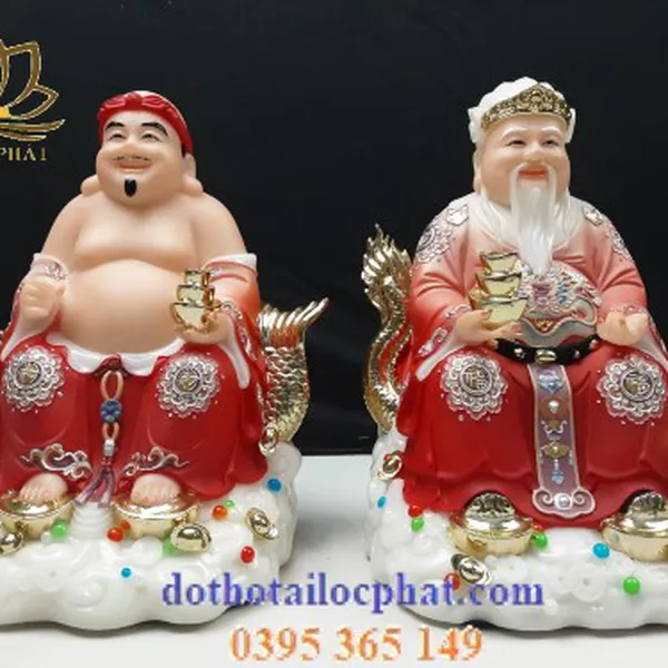 Tượng thần tài ông địa bằng đá màu đỏ