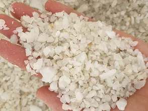 Why spread crushed quartz stone on the floor?