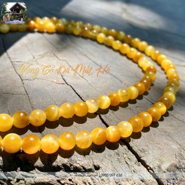 Vòng cổ đá mắt hổ tâm vàng tươi 6.5ly 108 hạt