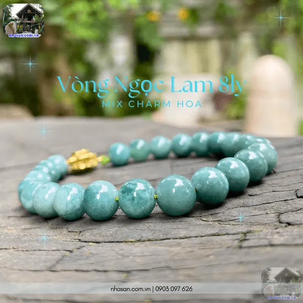Vòng ngọc lam 8ly mix charm hoa