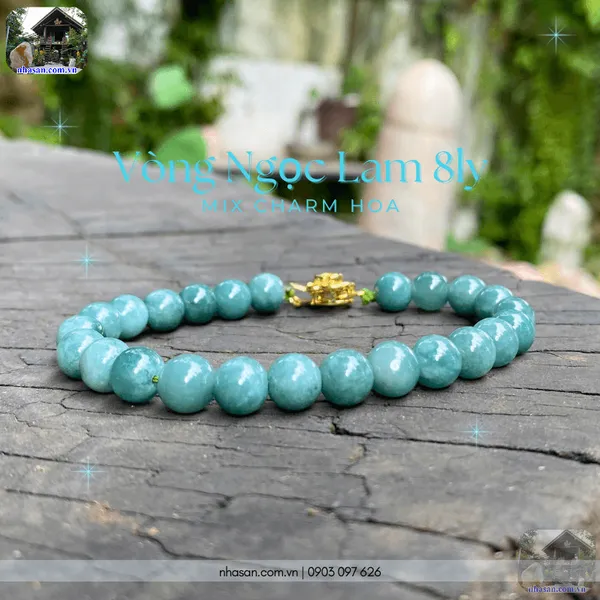 Vòng ngọc lam 8ly mix charm hoa