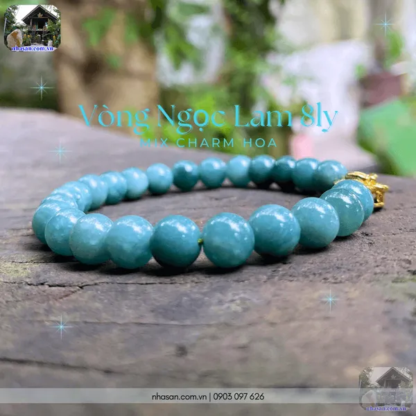 Vòng ngọc lam 8ly mix charm hoa