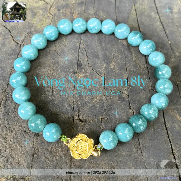 Vòng ngọc lam 8ly mix charm hoa