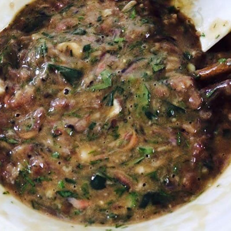 Trộn đều các nguyên liệu và gia vị cho món chả rươi chiên thơm ngon béo ngậy Trộn đều các nguyên liệu và gia vị cho món chả rươi chiên thơm ngon béo ngậy