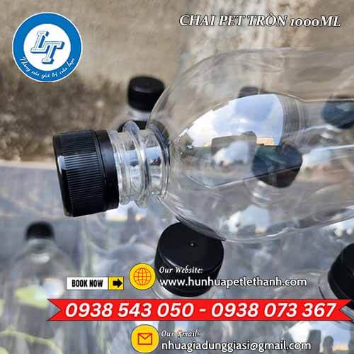 Chai nhựa PET tròn 1000ml nắp đen miệng nhỏ mẫu đẹp 2 Chai nhựa PET tròn 1000ml nắp đen miệng nhỏ mẫu đẹp 2