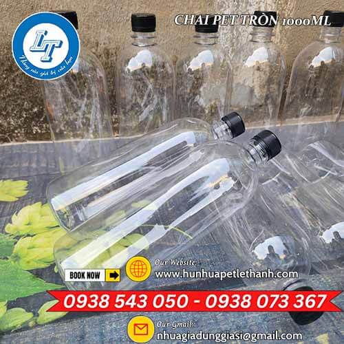 Chai nhựa PET tròn 1000ml nắp đen miệng nhỏ mẫu đẹp 4 Chai nhựa PET tròn 1000ml nắp đen miệng nhỏ mẫu đẹp 4