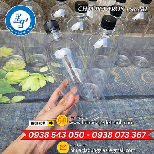Chai nhựa PET tròn 1000ml nắp đen miệng nhỏ mẫu đẹp 1 Chai nhựa PET tròn 1000ml nắp đen miệng nhỏ mẫu đẹp 1