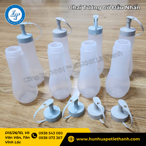 hình ảnh thực tế chai nhựa đựng tương có đầu nhấn hình ảnh thực tế chai nhựa đựng tương có đầu nhấn