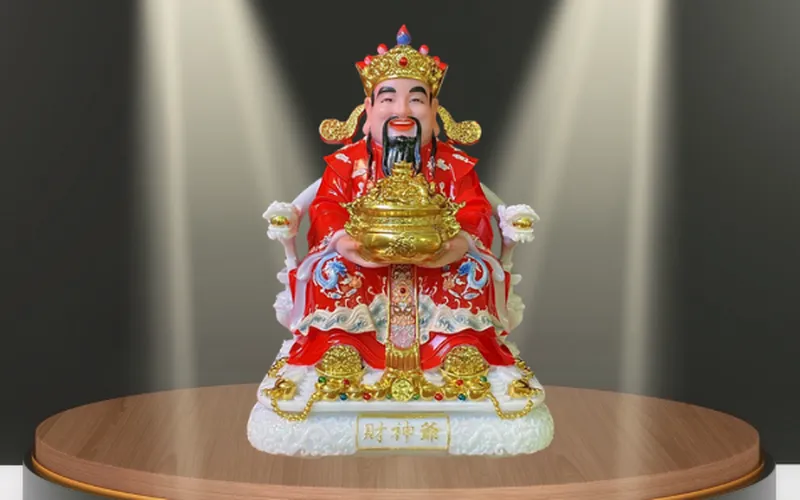 Thần Tiền tay cầm lư vàng màu Đỏ