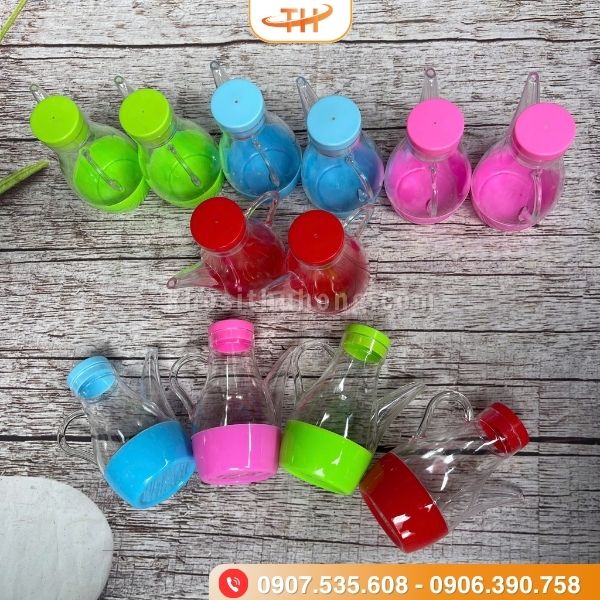 Bình nước mắm nhựa trong suốt với đa dạng màu sắc Bình nước mắm nhựa trong suốt với đa dạng màu sắc