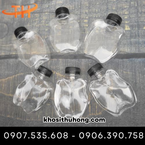 Chai trái táo đựng nước ép