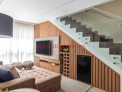 Bảng giá thi công vách ngăn cầu thang kết hợp kệ tivi chuẩn nhất