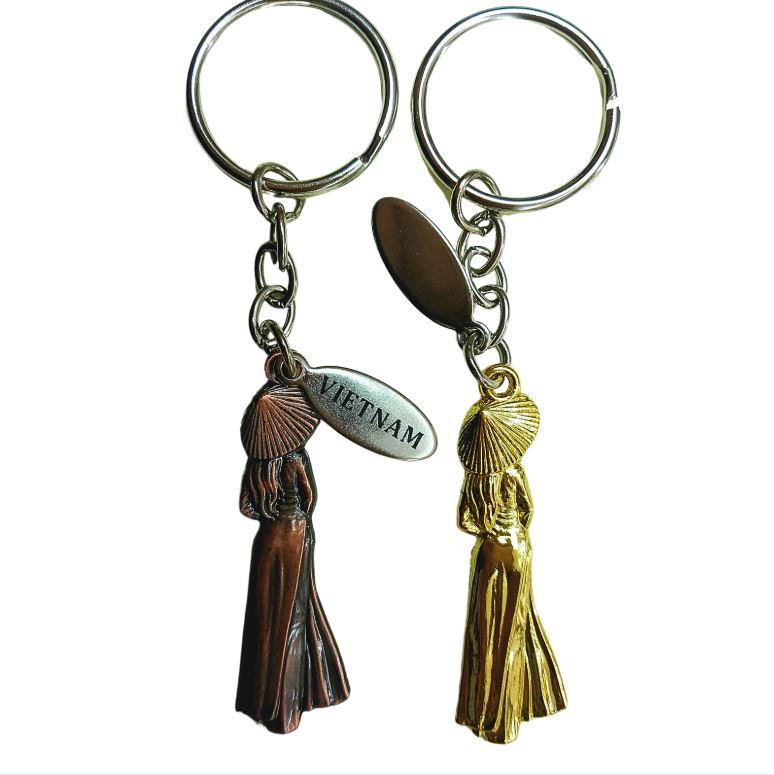 Móc khoá cô gái áo dài Việt Nam bằng kim loại Móc khoá cô gái áo dài Việt Nam bằng kim loại