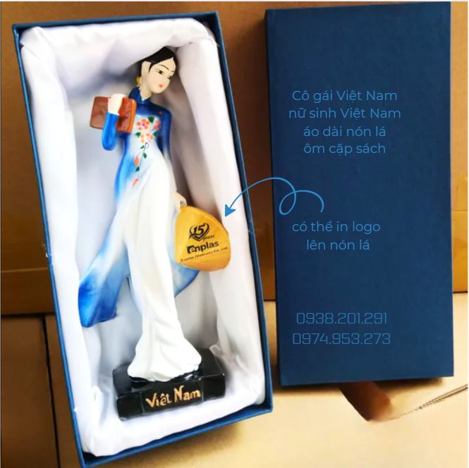 Tượng cô gái Việt Nam đội nón lá, áo dài truyền thống Tượng cô gái Việt Nam đội nón lá, áo dài truyền thống