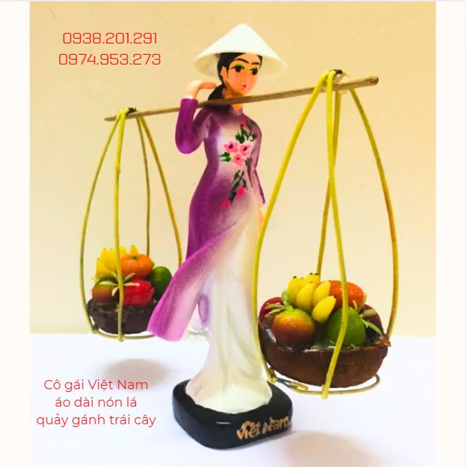 Tượng cô gái Việt Nam đội nón lá, áo dài truyền thống Tượng cô gái Việt Nam đội nón lá, áo dài truyền thống