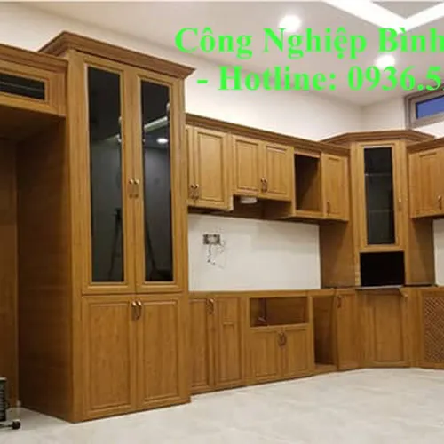 Top 5+ Mẫu Tủ Bếp Nhôm Kính Giả Gỗ Đẹp Sang Trọng Nhất 2025