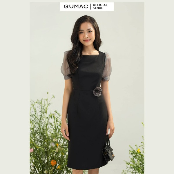 Đầm bút chì đính nơ thời trang nữ GUMAC đen Đầm bút chì đính nơ thời trang nữ GUMAC đen