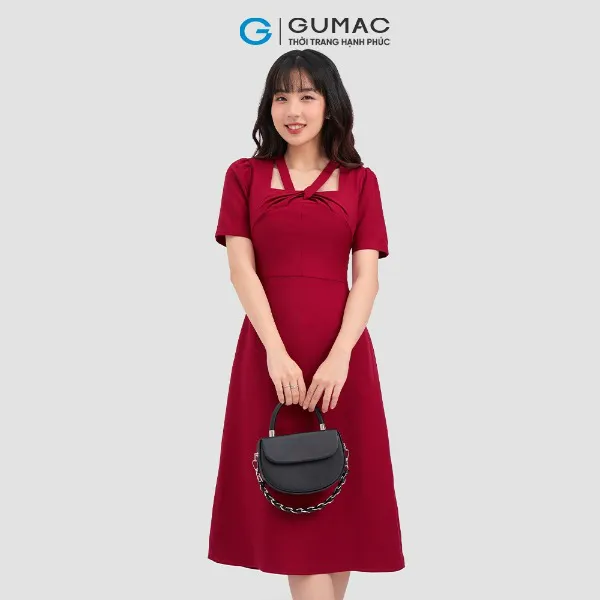 Đầm xoắn cổ thời trang GUMAC