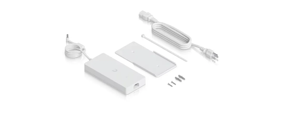 Trong hộp Adapter nguồn UniFi 210W: adapter, giá treo tường, dây nguồn AC, dây rút và vít Trong hộp Adapter nguồn UniFi 210W: adapter, giá treo tường, dây nguồn AC, dây rút và vít