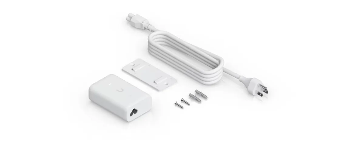 Trong hộp Bộ cấp nguồn PoE+ UniFi Gigabit: bộ cấp nguồn, giá treo tường, dây nguồn AC và vít Trong hộp Bộ cấp nguồn PoE+ UniFi Gigabit: bộ cấp nguồn, giá treo tường, dây nguồn AC và vít
