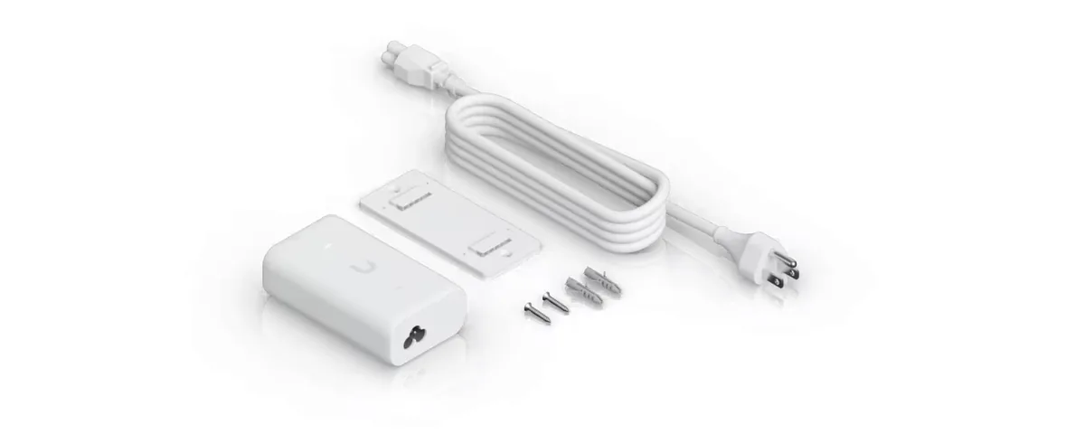 Trong hộp Bộ cấp nguồn PoE++ UniFi Gigabit: bộ cấp nguồn, giá treo tường, dây nguồn AC và vít Trong hộp Bộ cấp nguồn PoE++ UniFi Gigabit: bộ cấp nguồn, giá treo tường, dây nguồn AC và vít