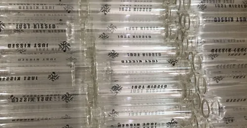 In tampon trên vỏ chai nước hoa