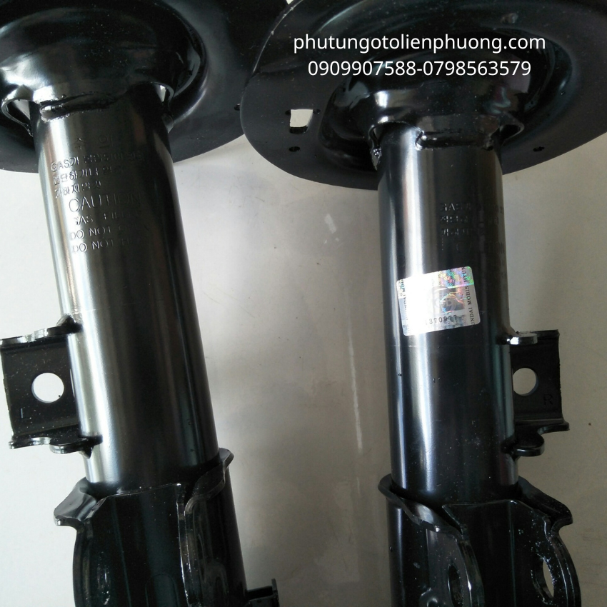 giảm xóc trước huyndai coupe giảm xóc trước huyndai coupe