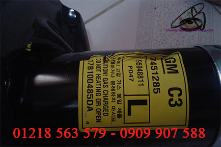 giảm xóc trước trái xe captiva giảm xóc trước trái xe captiva